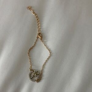 Elegant Gold Peace Sign Bracelet
